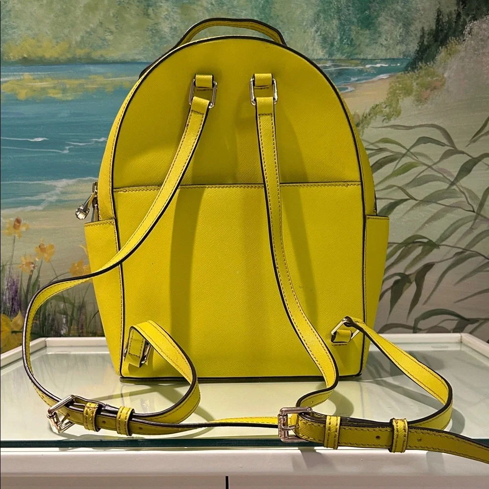 Henri Bendel West 57th Yellow Saffiano Leather Backpack with Colorful Tassels